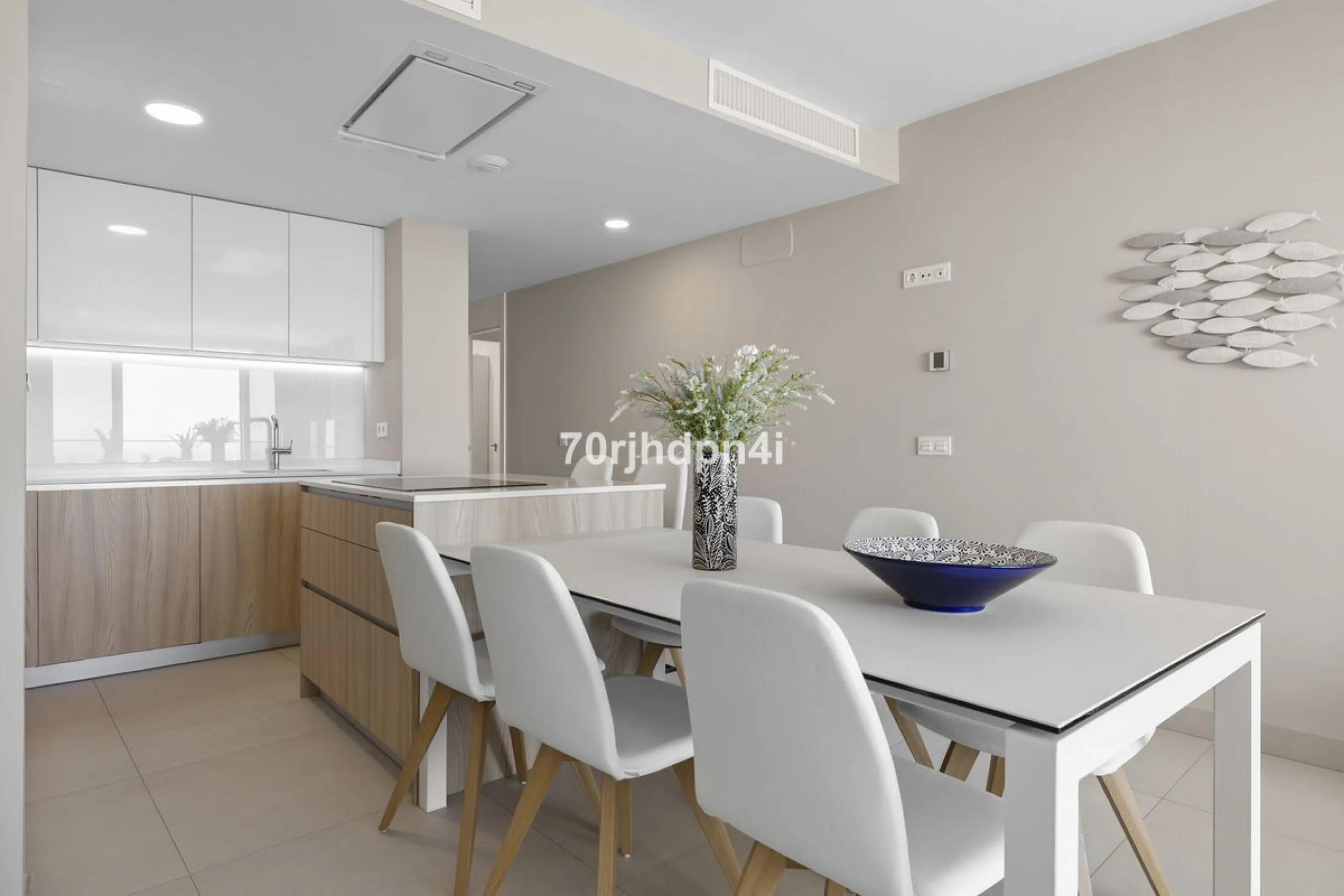 Modern first-floor apartment in ONE Residences, Calanova Golf, offering panoramic sea and golf views. South-facing with a spacious 40 m² terrace.