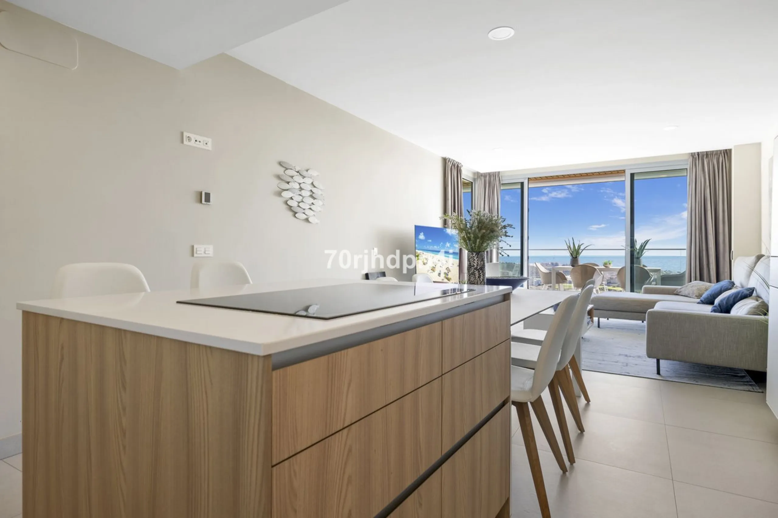 Modern first-floor apartment in ONE Residences, Calanova Golf, offering panoramic sea and golf views. South-facing with a spacious 40 m² terrace.