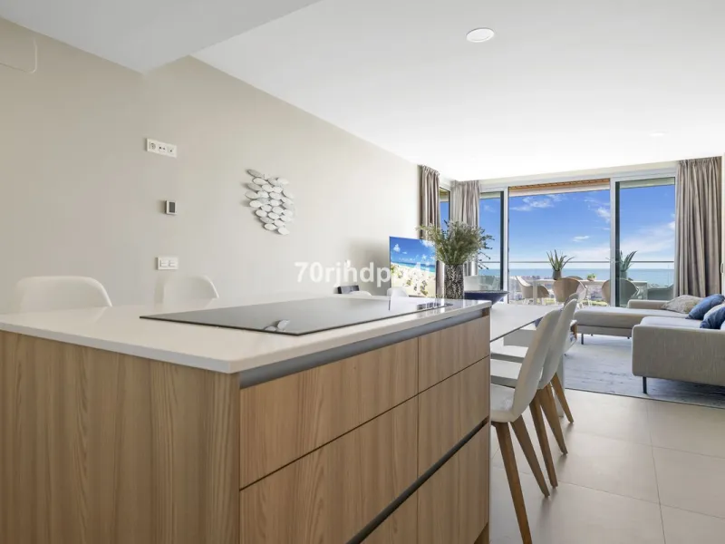 Modern first-floor apartment in ONE Residences, Calanova Golf, offering panoramic sea and golf views. South-facing with a spacious 40 m² terrace.