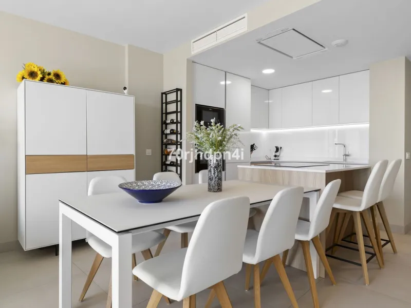 Modern first-floor apartment in ONE Residences, Calanova Golf, offering panoramic sea and golf views. South-facing with a spacious 40 m² terrace.