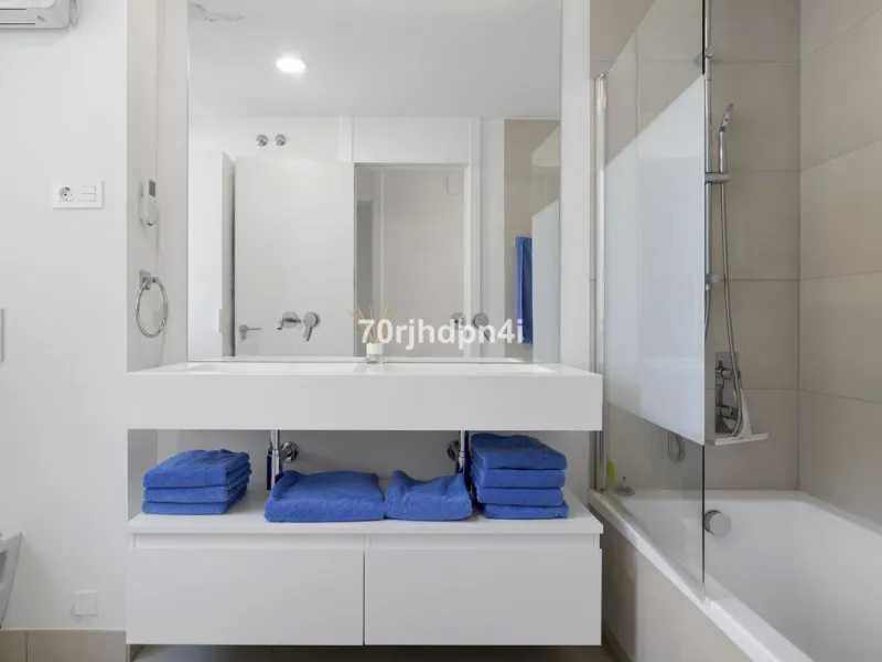 Modern first-floor apartment in ONE Residences, Calanova Golf, offering panoramic sea and golf views. South-facing with a spacious 40 m² terrace.