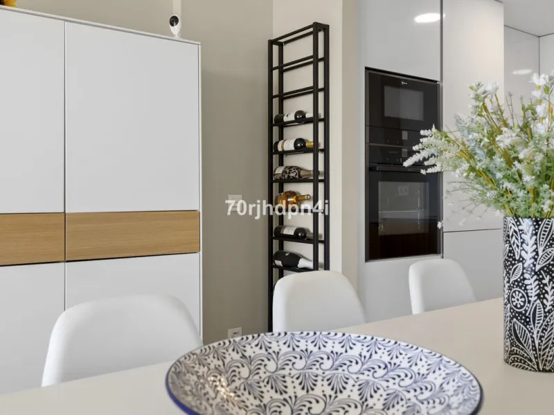 Modern first-floor apartment in ONE Residences, Calanova Golf, offering panoramic sea and golf views. South-facing with a spacious 40 m² terrace.