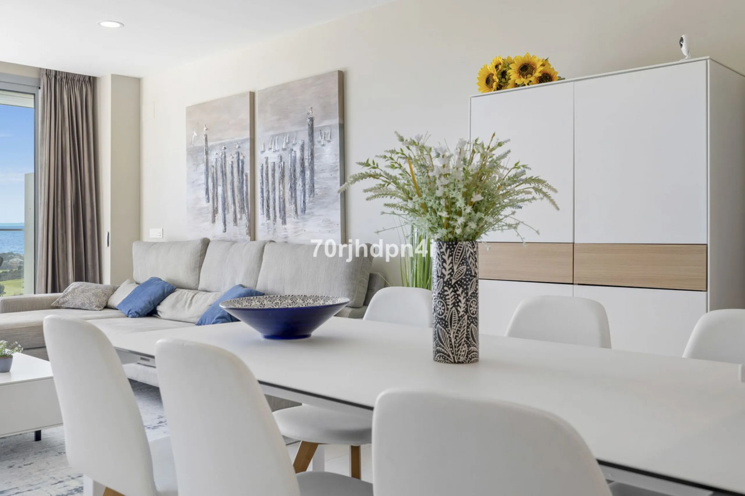 Modern first-floor apartment in ONE Residences, Calanova Golf, offering panoramic sea and golf views. South-facing with a spacious 40 m² terrace.