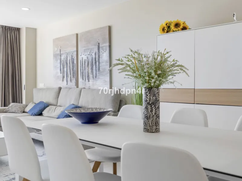Modern first-floor apartment in ONE Residences, Calanova Golf, offering panoramic sea and golf views. South-facing with a spacious 40 m² terrace.