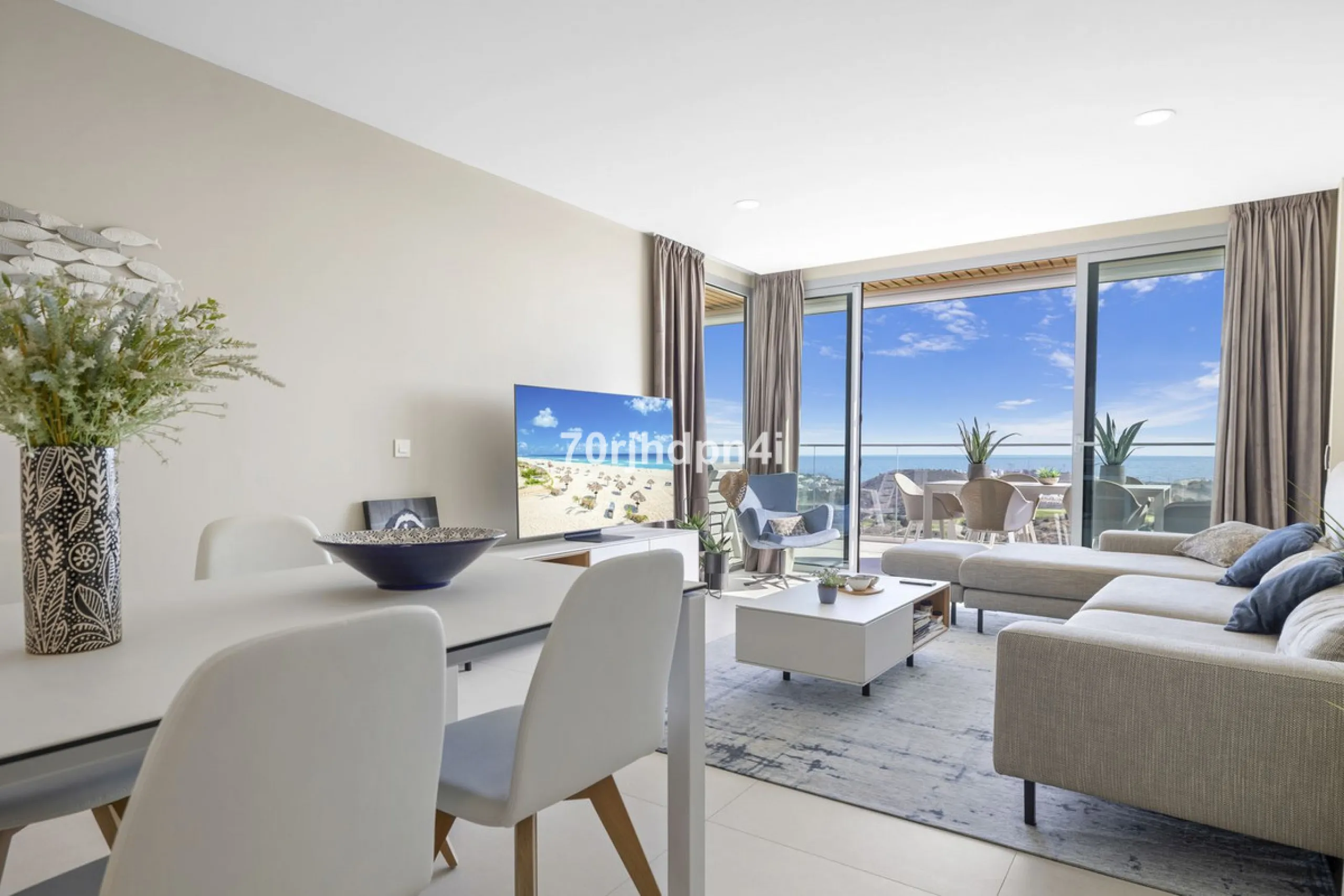 Modern first-floor apartment in ONE Residences, Calanova Golf, offering panoramic sea and golf views. South-facing with a spacious 40 m² terrace.