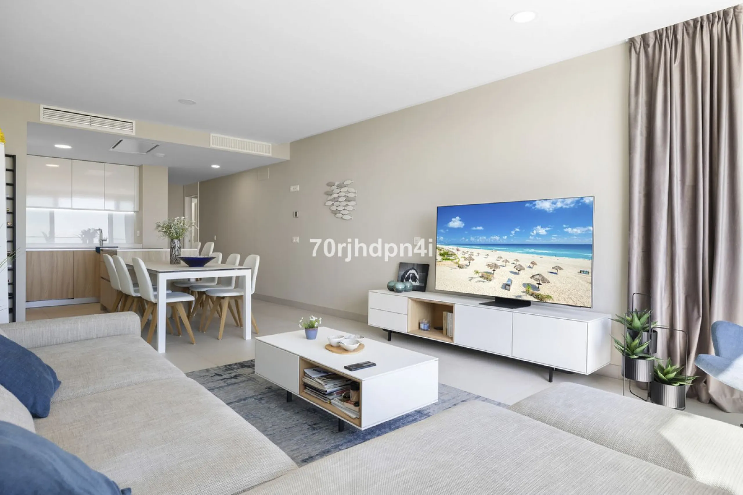 Modern first-floor apartment in ONE Residences, Calanova Golf, offering panoramic sea and golf views. South-facing with a spacious 40 m² terrace.