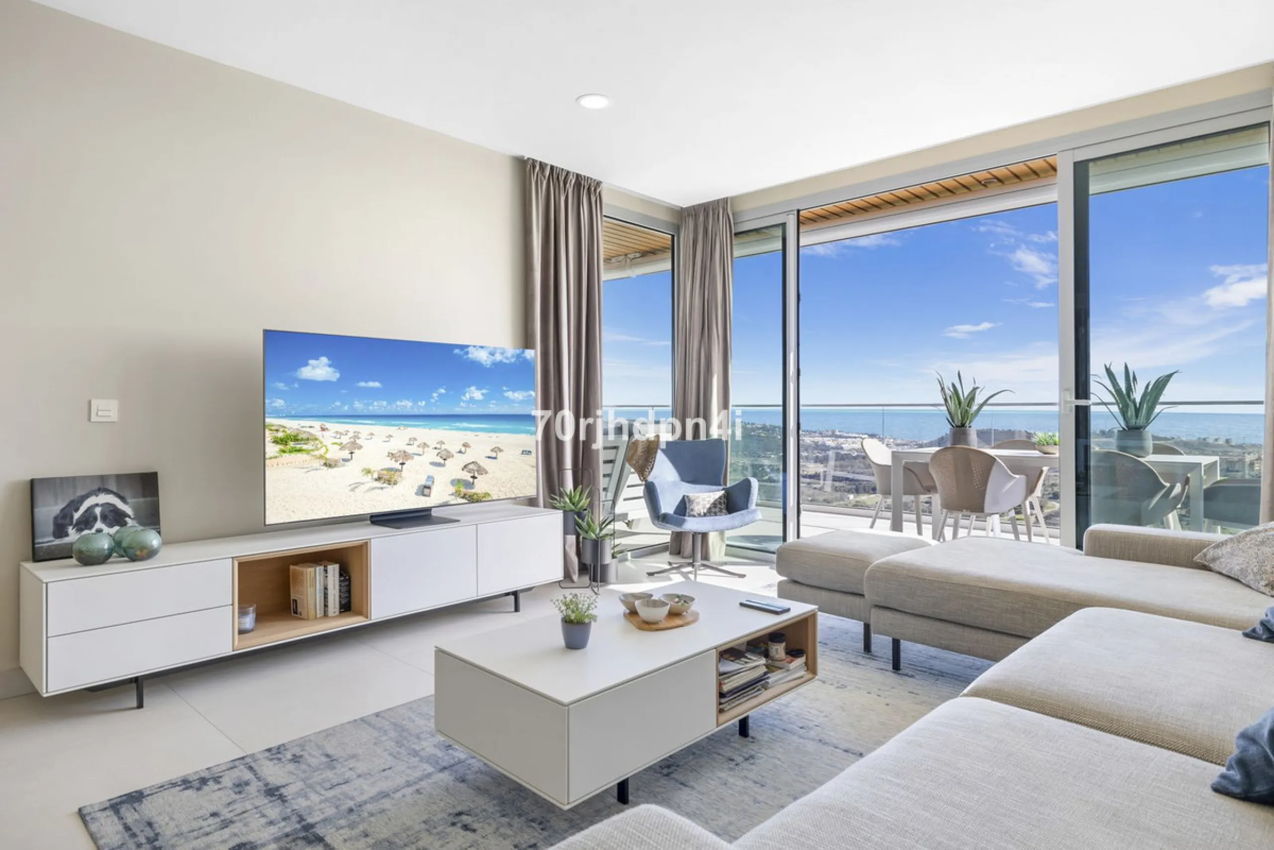 Modern first-floor apartment in ONE Residences, Calanova Golf, offering panoramic sea and golf views. South-facing with a spacious 40 m² terrace.