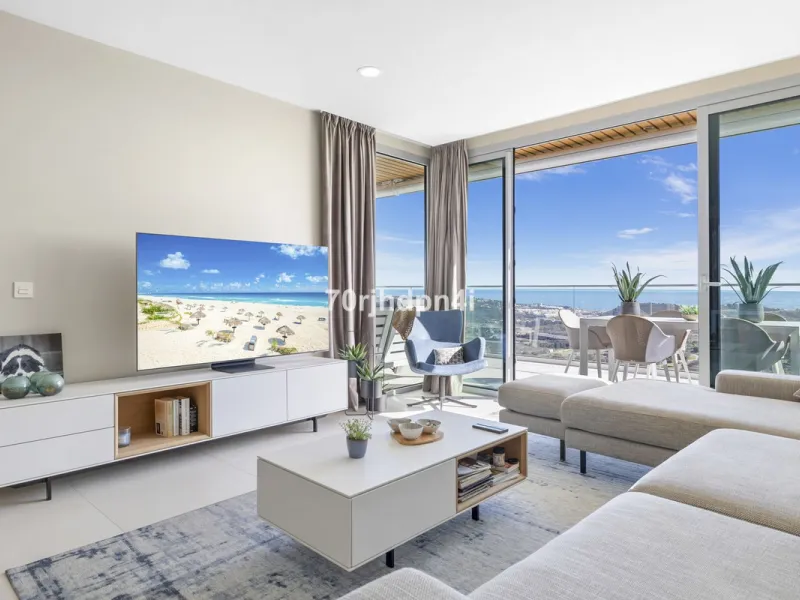 Modern first-floor apartment in ONE Residences, Calanova Golf, offering panoramic sea and golf views. South-facing with a spacious 40 m² terrace.