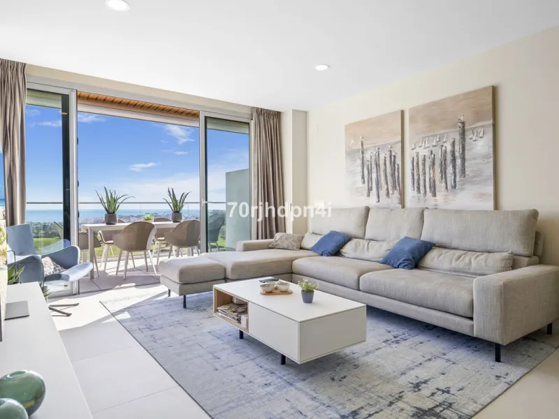 Modern first-floor apartment in ONE Residences, Calanova Golf, offering panoramic sea and golf views. South-facing with a spacious 40 m² terrace.
