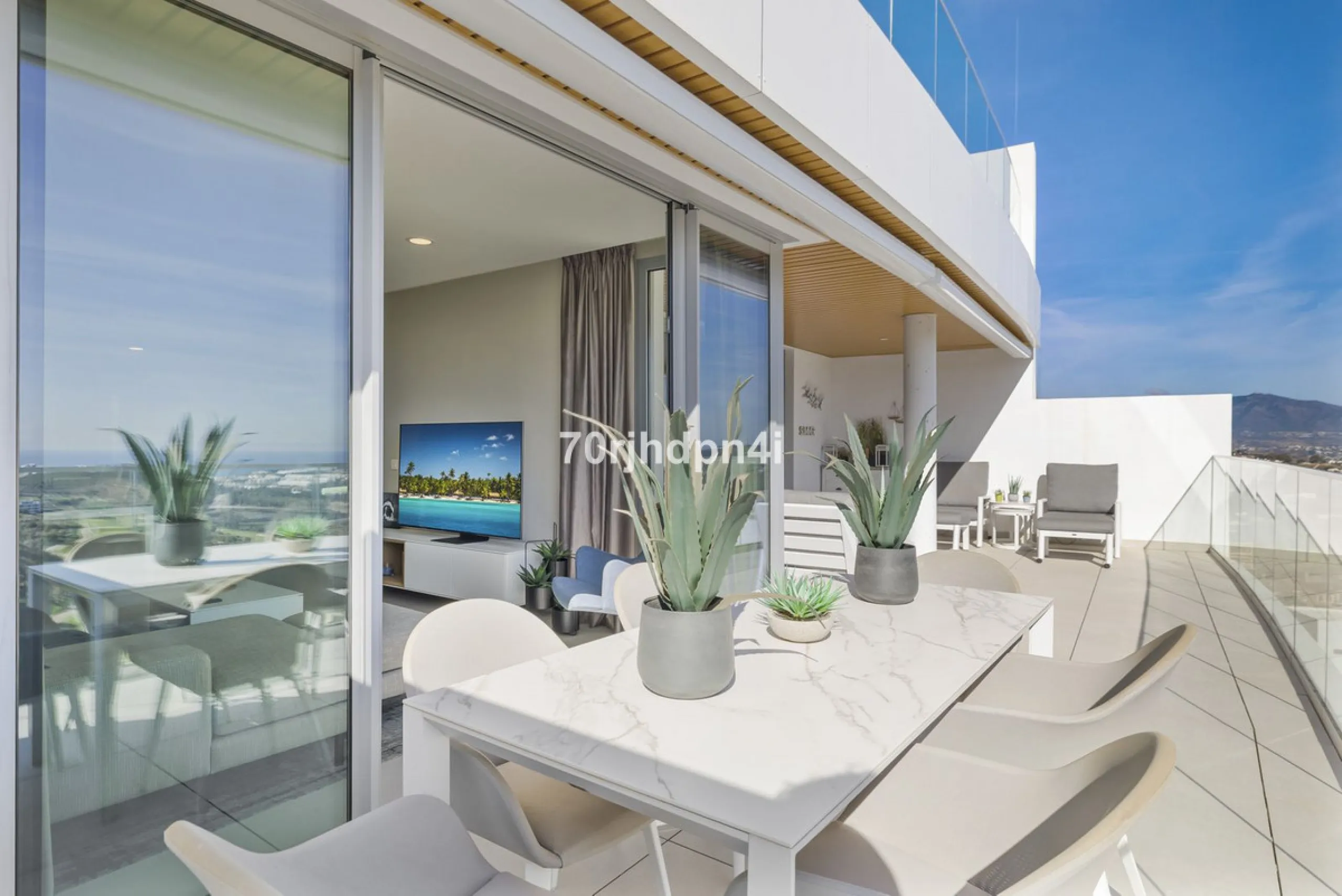 Modern first-floor apartment in ONE Residences, Calanova Golf, offering panoramic sea and golf views. South-facing with a spacious 40 m² terrace.