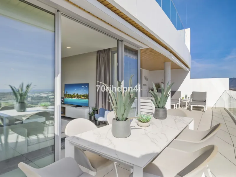 Modern first-floor apartment in ONE Residences, Calanova Golf, offering panoramic sea and golf views. South-facing with a spacious 40 m² terrace.