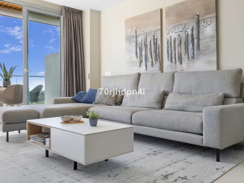 Modern first-floor apartment in ONE Residences, Calanova Golf, offering panoramic sea and golf views. South-facing with a spacious 40 m² terrace.