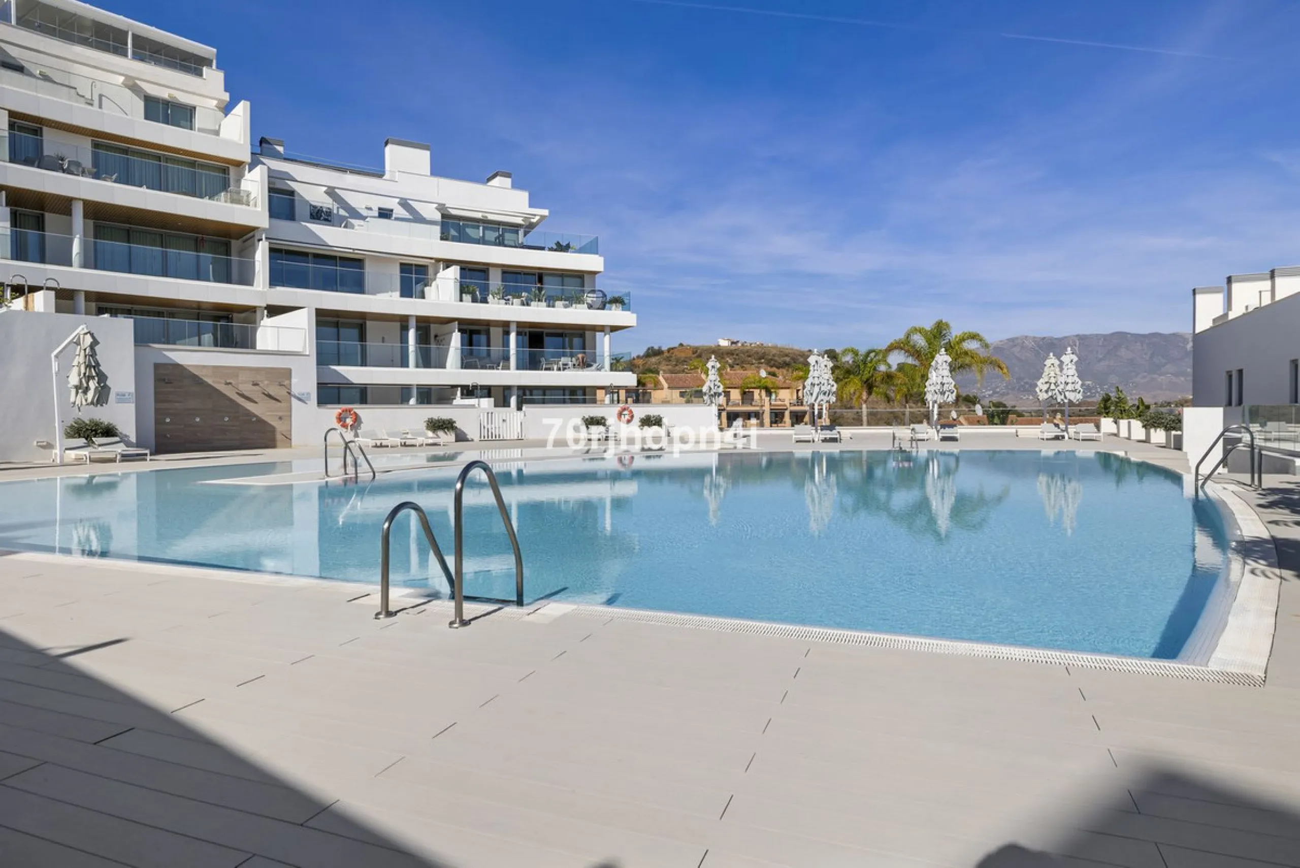 Modern first-floor apartment in ONE Residences, Calanova Golf, offering panoramic sea and golf views. South-facing with a spacious 40 m² terrace.