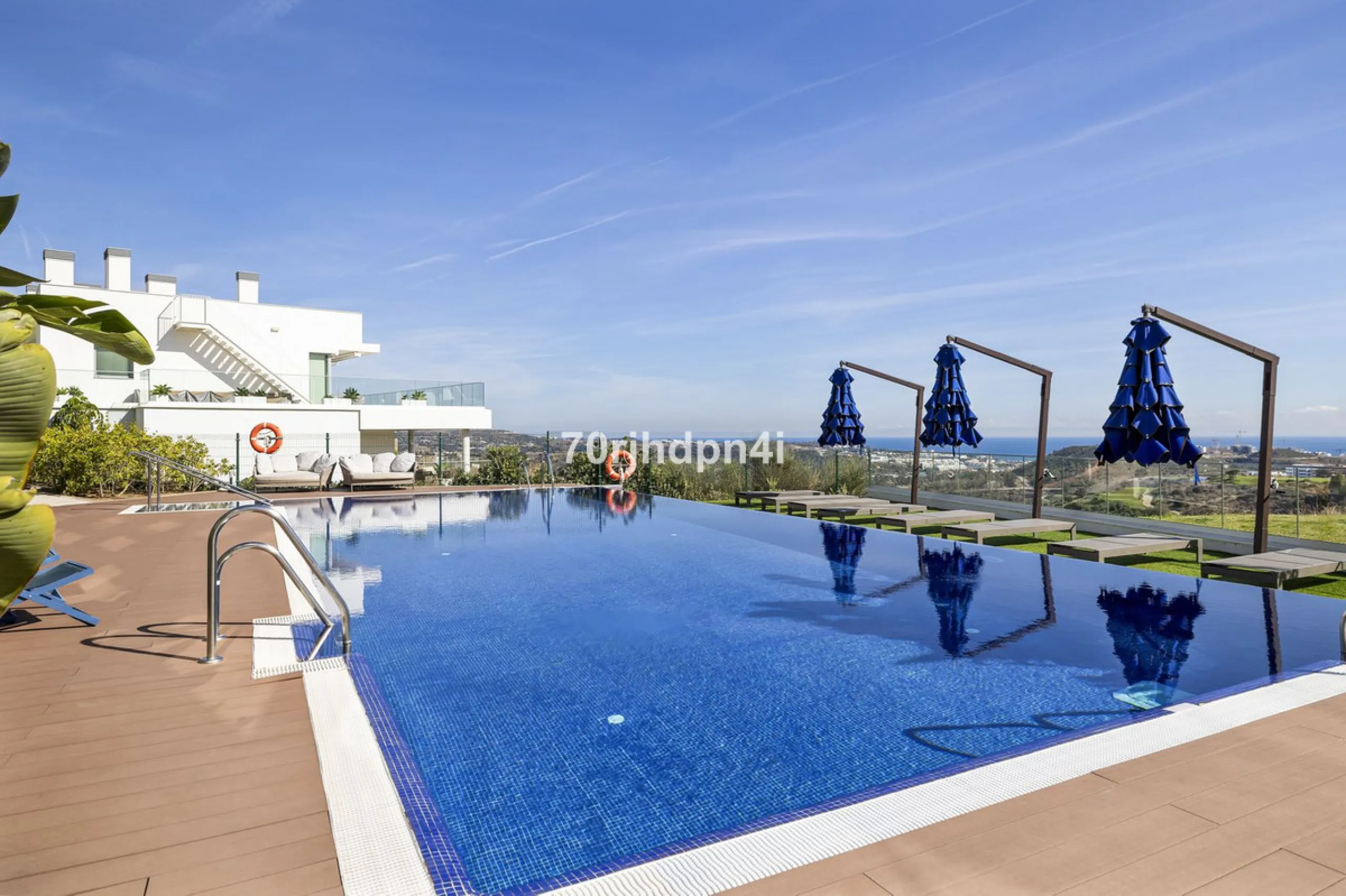 Modern first-floor apartment in ONE Residences, Calanova Golf, offering panoramic sea and golf views. South-facing with a spacious 40 m² terrace.