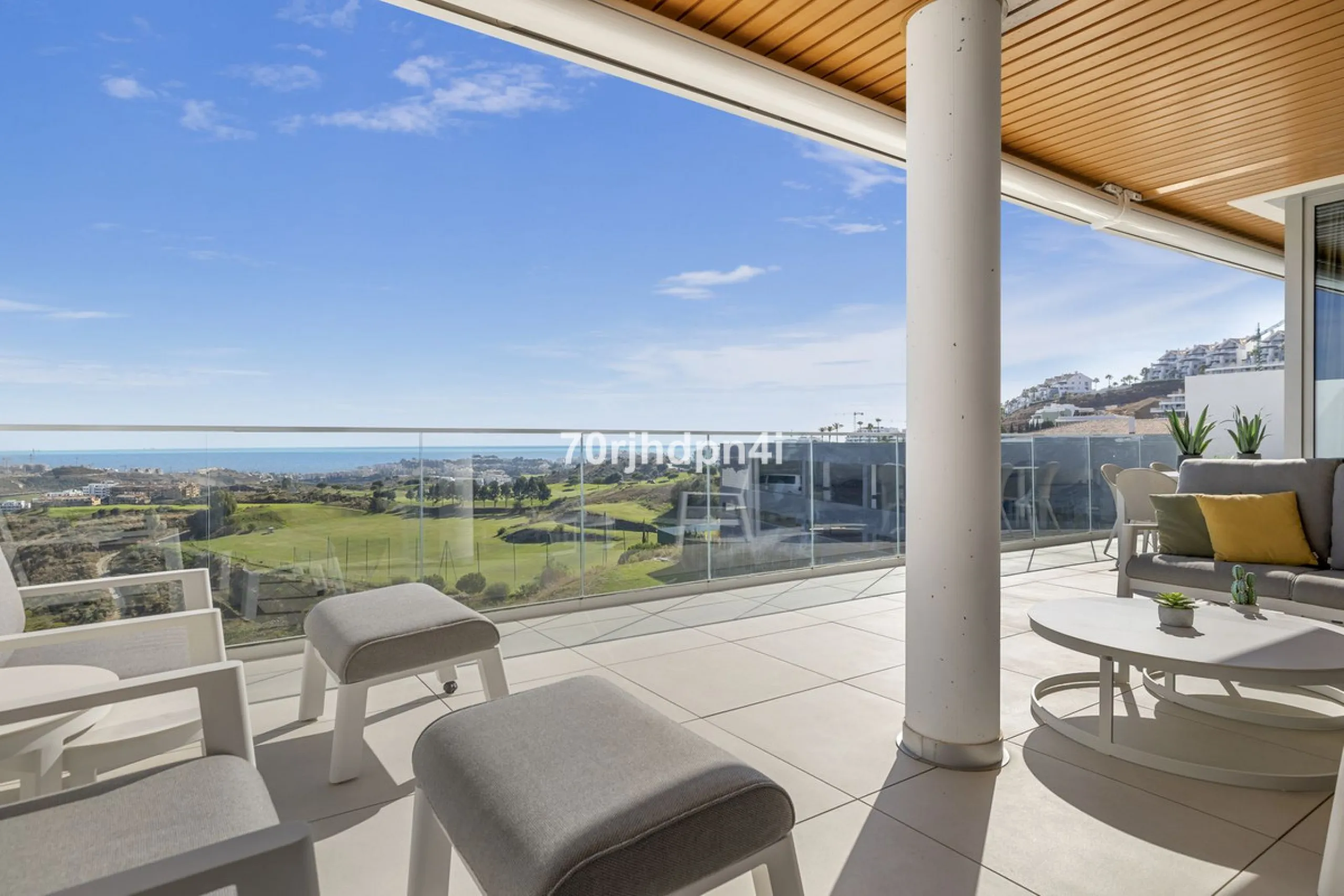 Modern first-floor apartment in ONE Residences, Calanova Golf, offering panoramic sea and golf views. South-facing with a spacious 40 m² terrace.