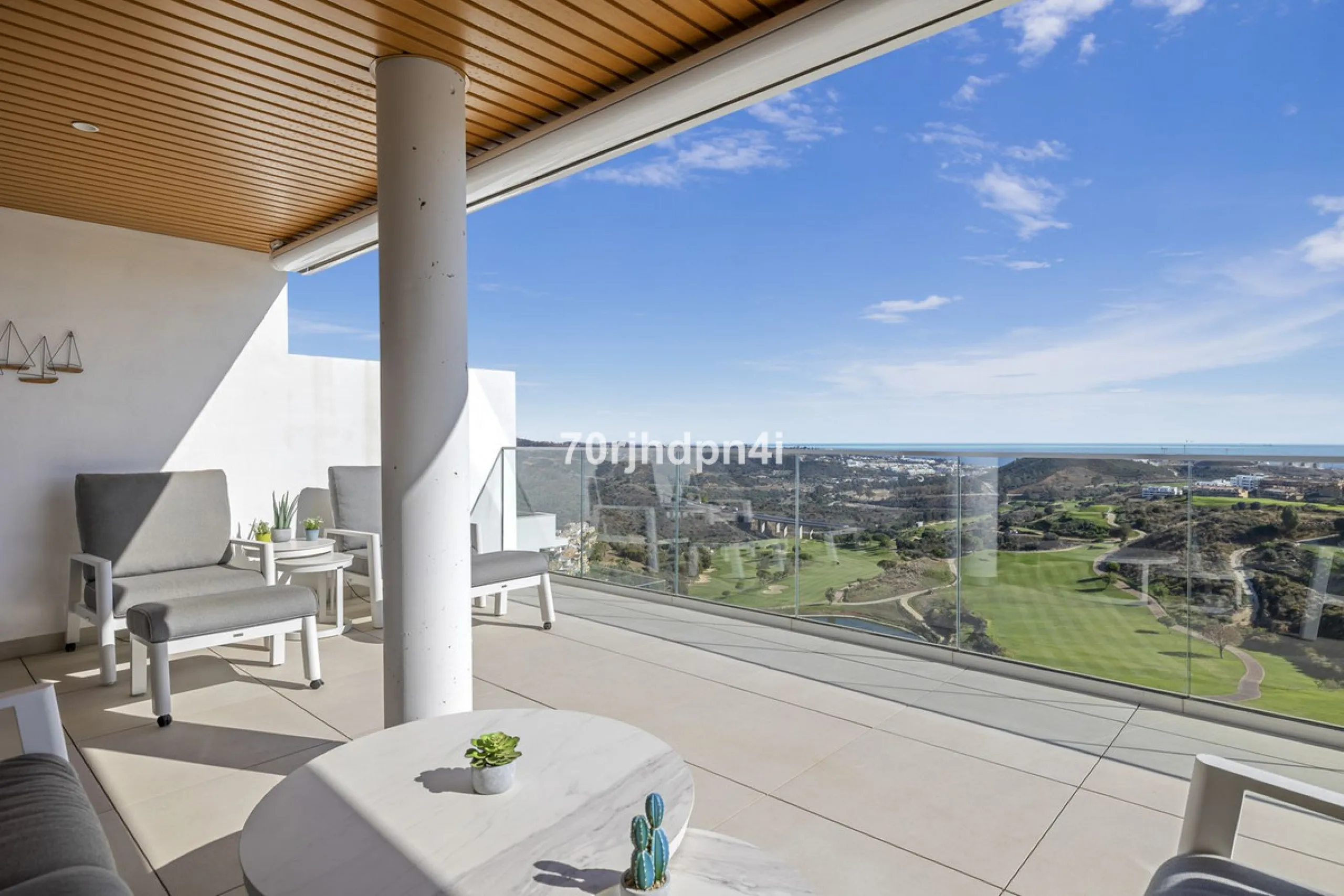 Modern first-floor apartment in ONE Residences, Calanova Golf, offering panoramic sea and golf views. South-facing with a spacious 40 m² terrace.