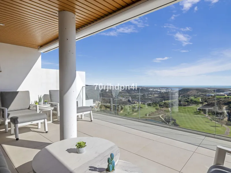 Modern first-floor apartment in ONE Residences, Calanova Golf, offering panoramic sea and golf views. South-facing with a spacious 40 m² terrace.