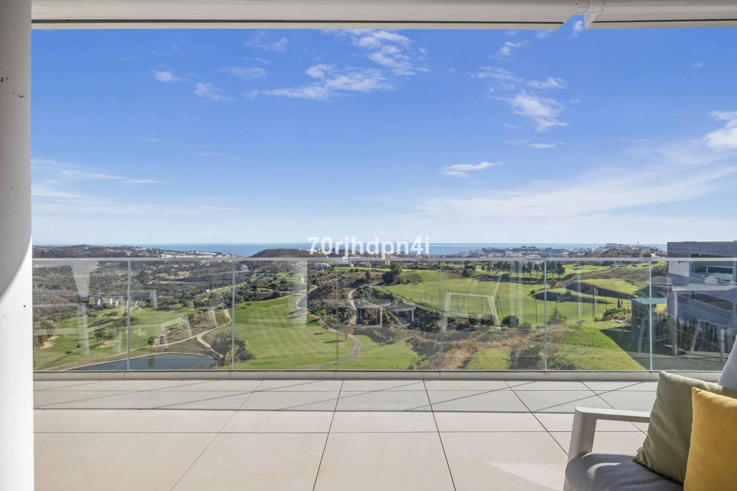 Modern first-floor apartment in ONE Residences, Calanova Golf, offering panoramic sea and golf views. South-facing with a spacious 40 m² terrace.