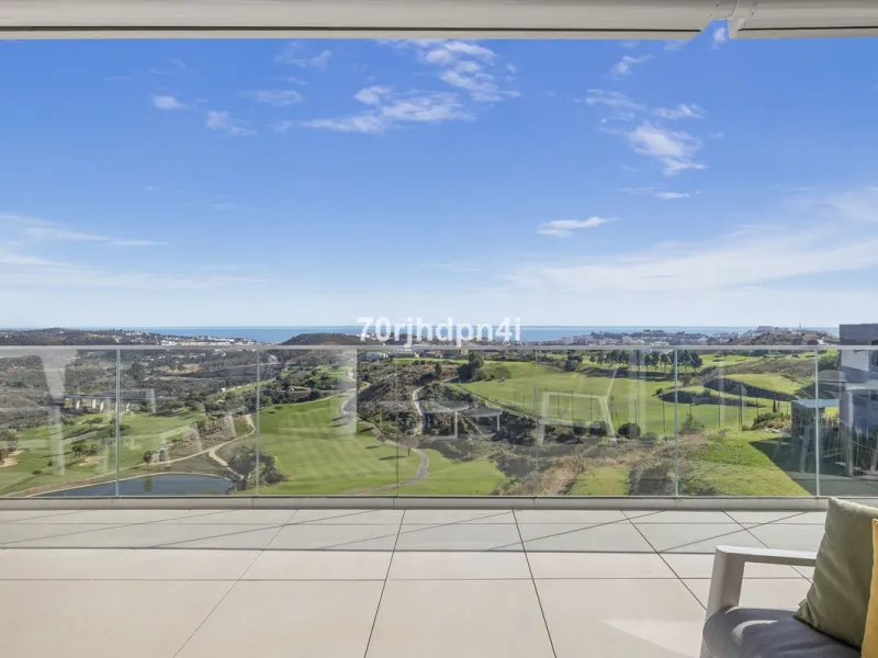 Modern first-floor apartment in ONE Residences, Calanova Golf, offering panoramic sea and golf views. South-facing with a spacious 40 m² terrace.
