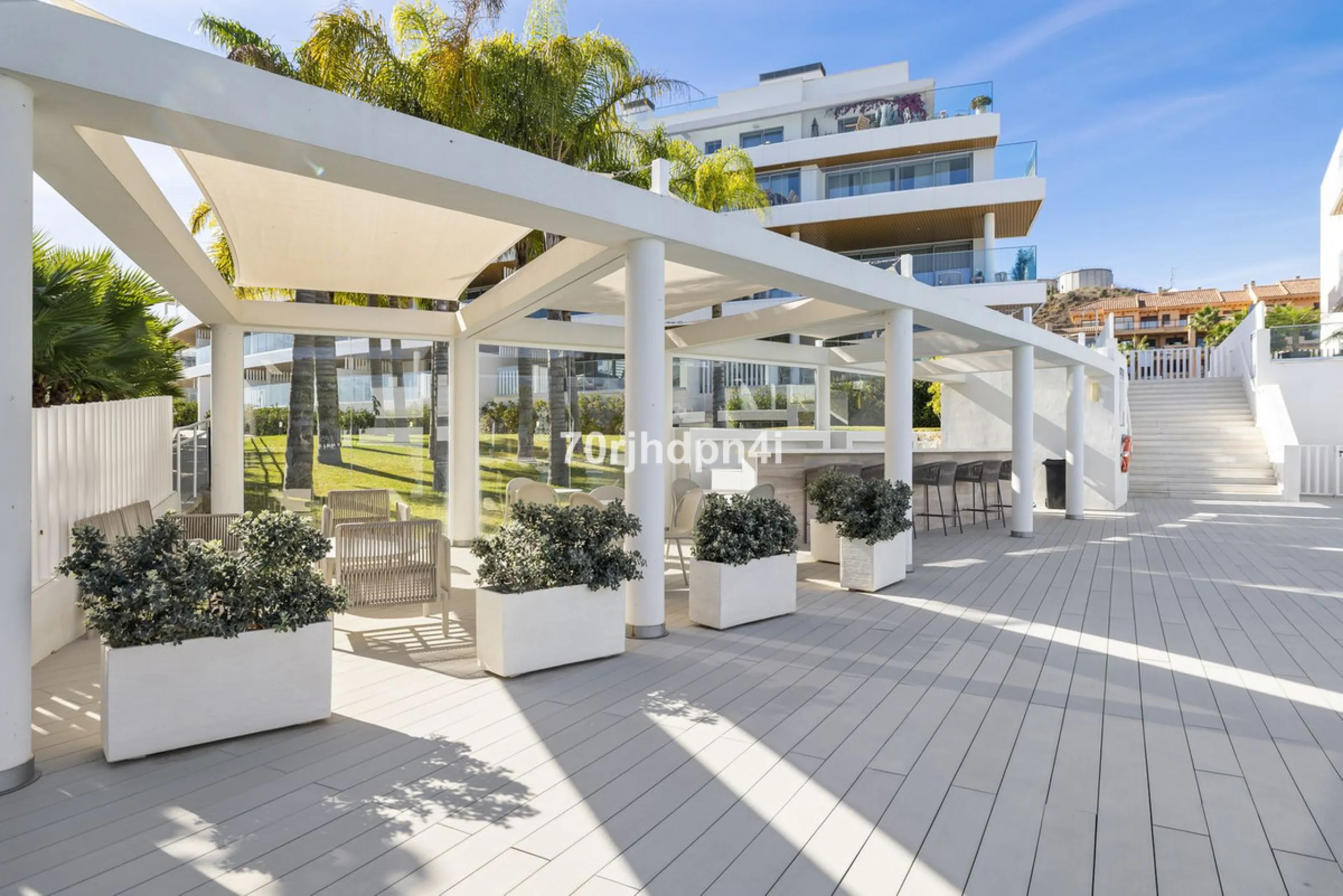 Modern first-floor apartment in ONE Residences, Calanova Golf, offering panoramic sea and golf views. South-facing with a spacious 40 m² terrace.