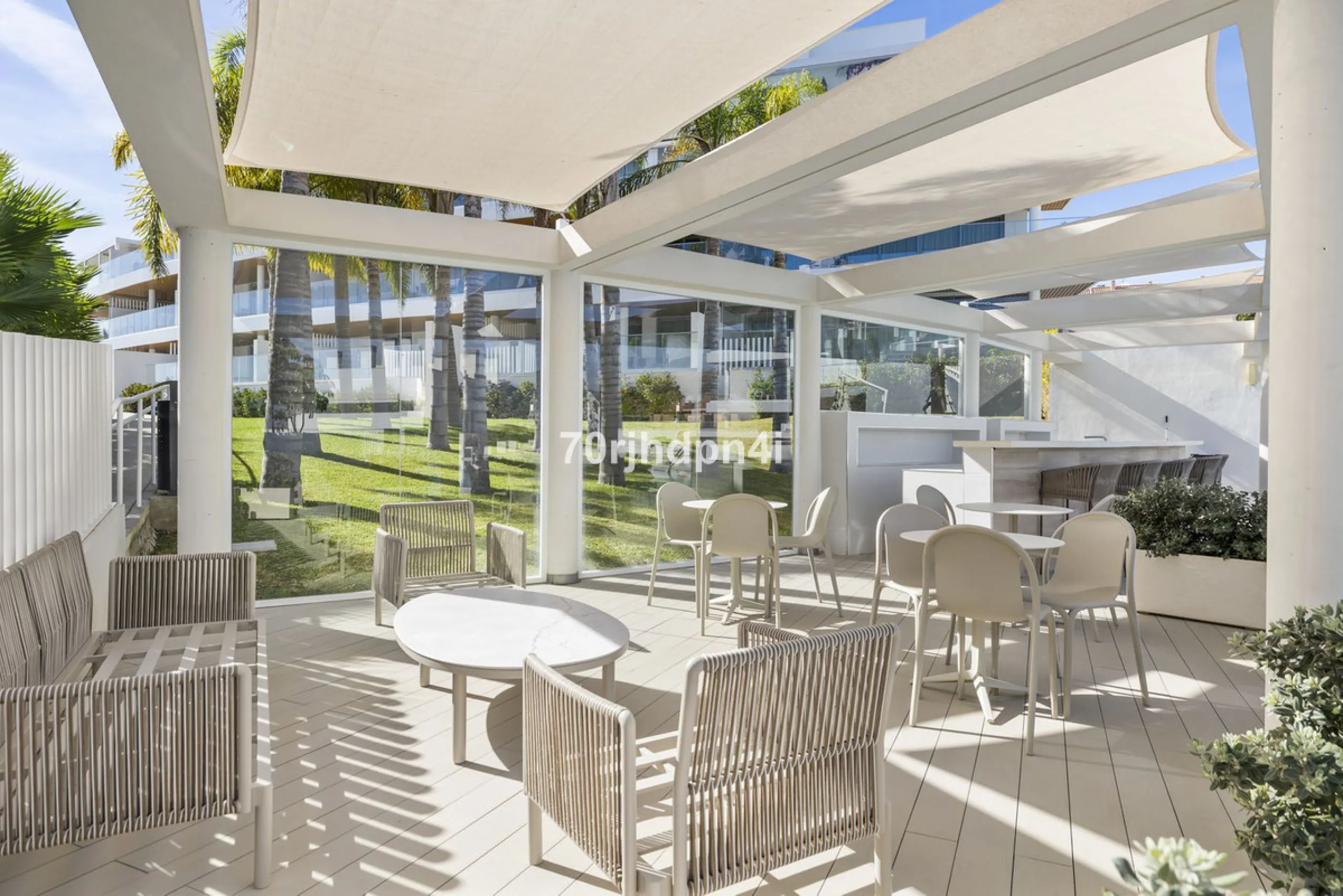 Modern first-floor apartment in ONE Residences, Calanova Golf, offering panoramic sea and golf views. South-facing with a spacious 40 m² terrace.