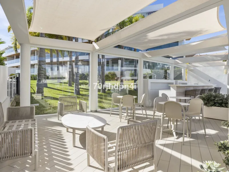 Modern first-floor apartment in ONE Residences, Calanova Golf, offering panoramic sea and golf views. South-facing with a spacious 40 m² terrace.