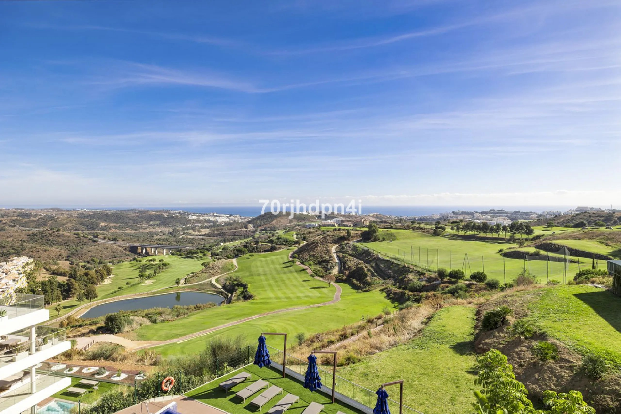 Modern first-floor apartment in ONE Residences, Calanova Golf, offering panoramic sea and golf views. South-facing with a spacious 40 m² terrace.