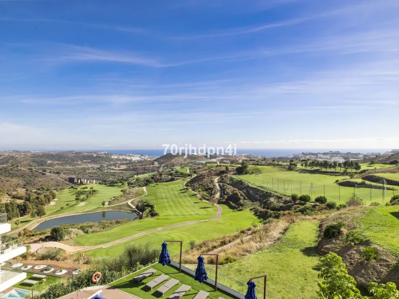 Modern first-floor apartment in ONE Residences, Calanova Golf, offering panoramic sea and golf views. South-facing with a spacious 40 m² terrace.