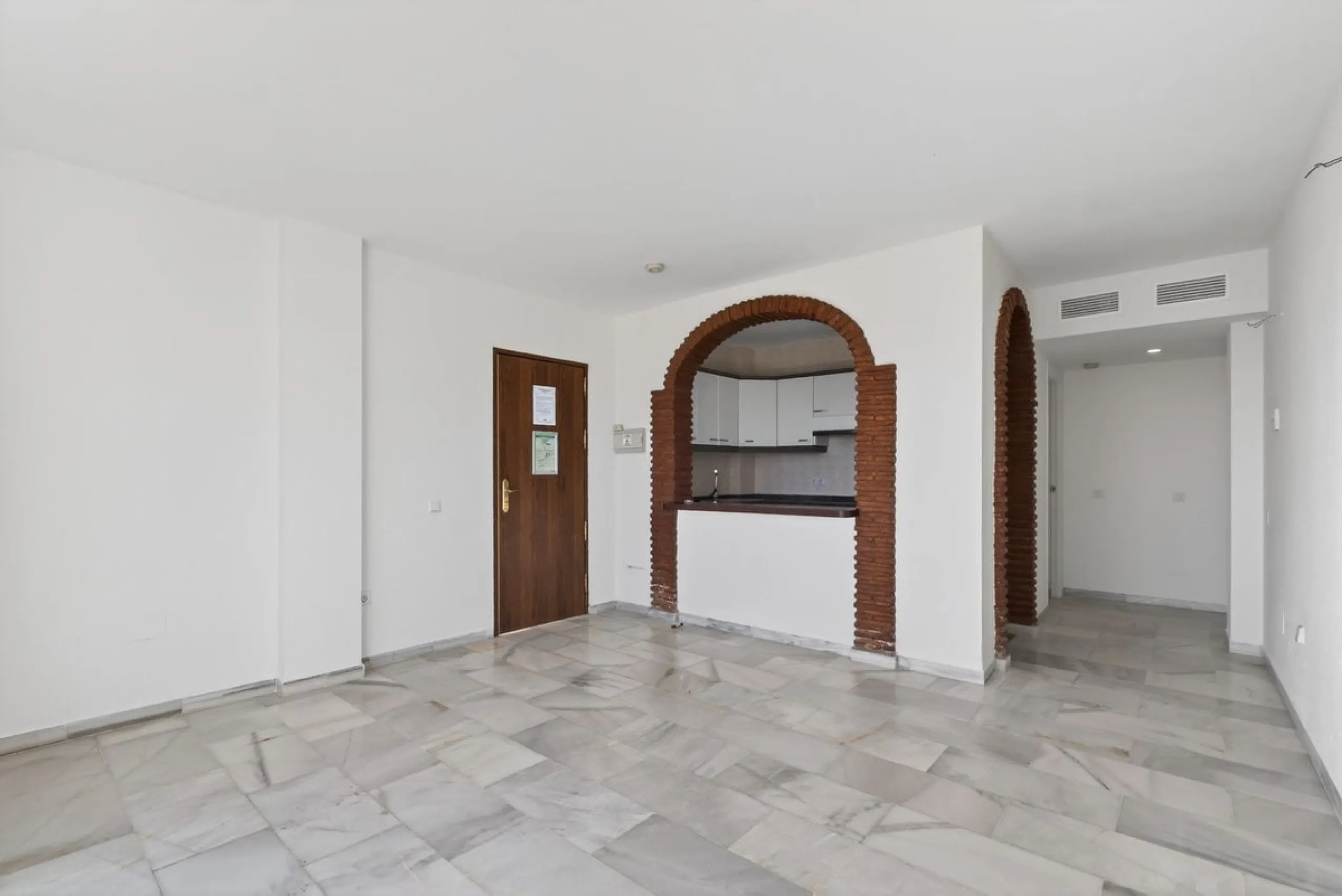 Welcome to this stunning 2-bedroom, 2-bathroom apartment in the heart of Calahonda! This prime example of modern living on the Costa del Sol offers a generous 93 sqm of living space, featuring two terraces with breathtaking views of the sea, garden, and c