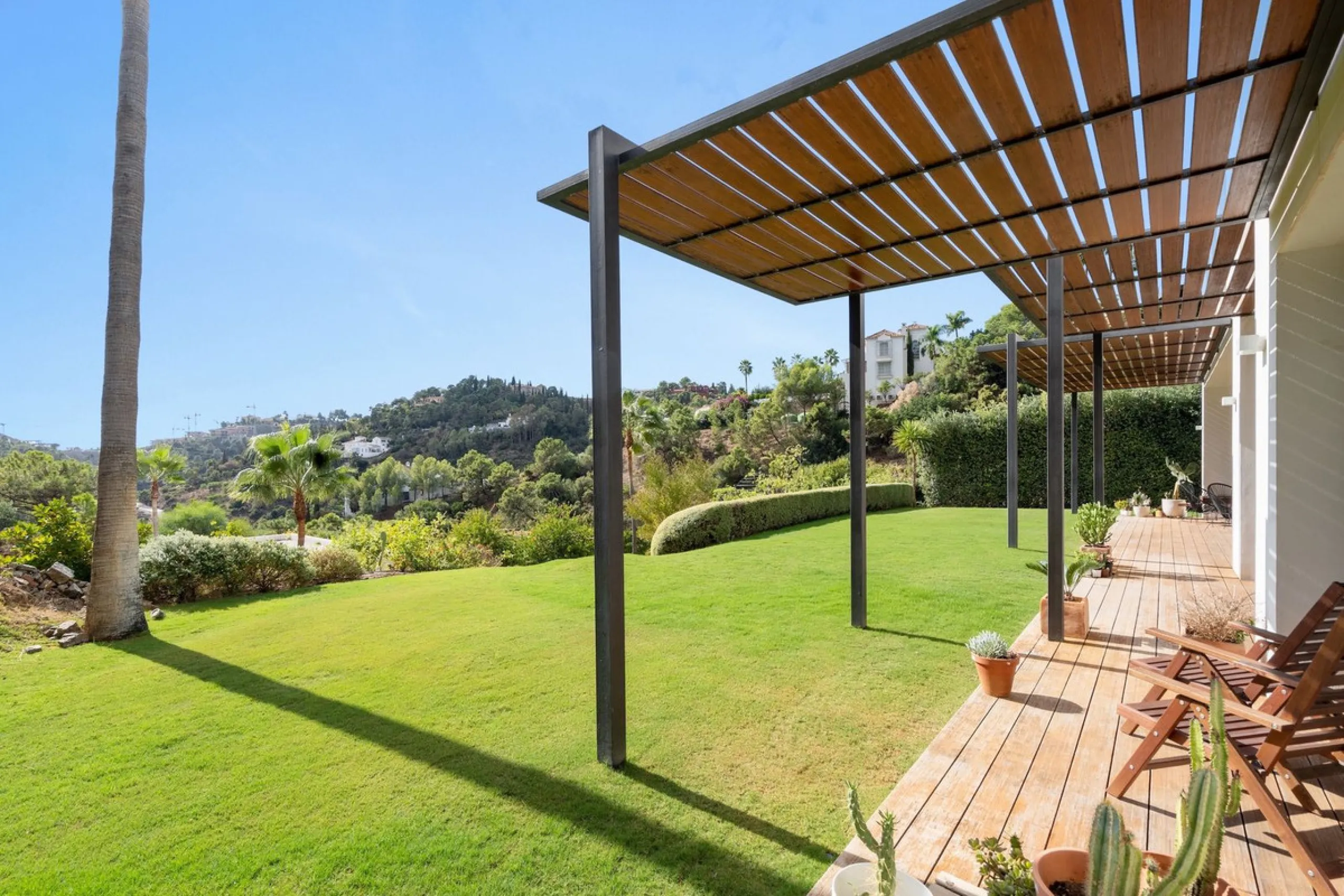 Modern Mediterranean villa in El Madroñal, a contemporary hillside retreat with breathtaking mountain and sea views.