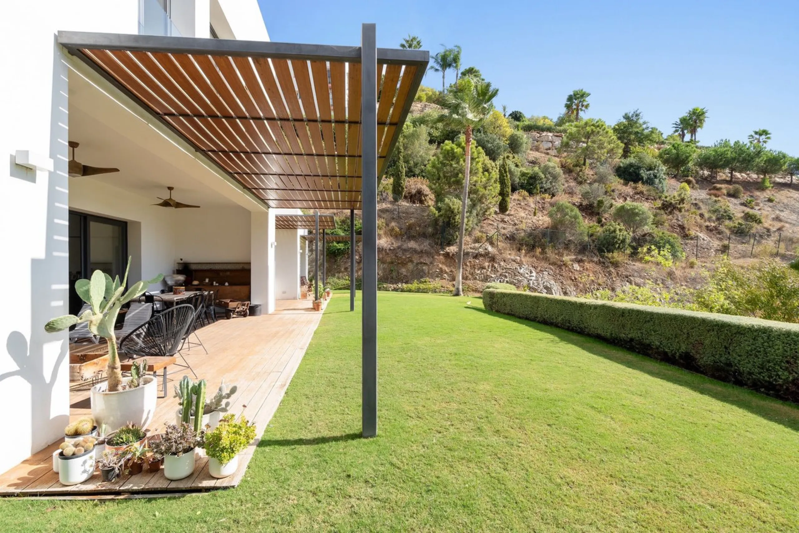Modern Mediterranean villa in El Madroñal, a contemporary hillside retreat with breathtaking mountain and sea views.