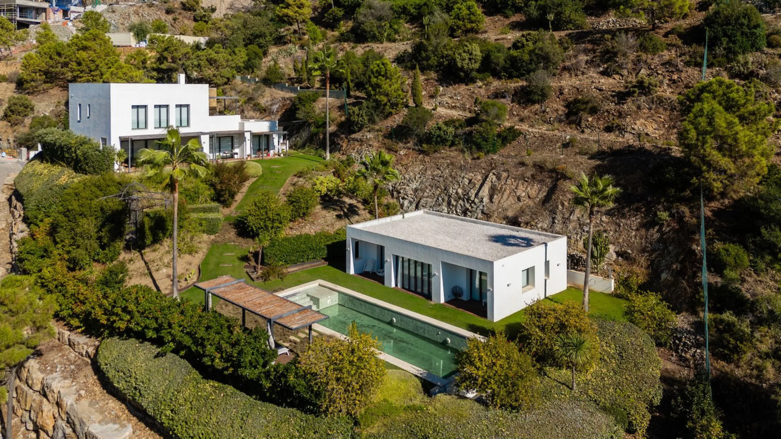 Modern Mediterranean villa in El Madroñal, a contemporary hillside retreat with breathtaking mountain and sea views.