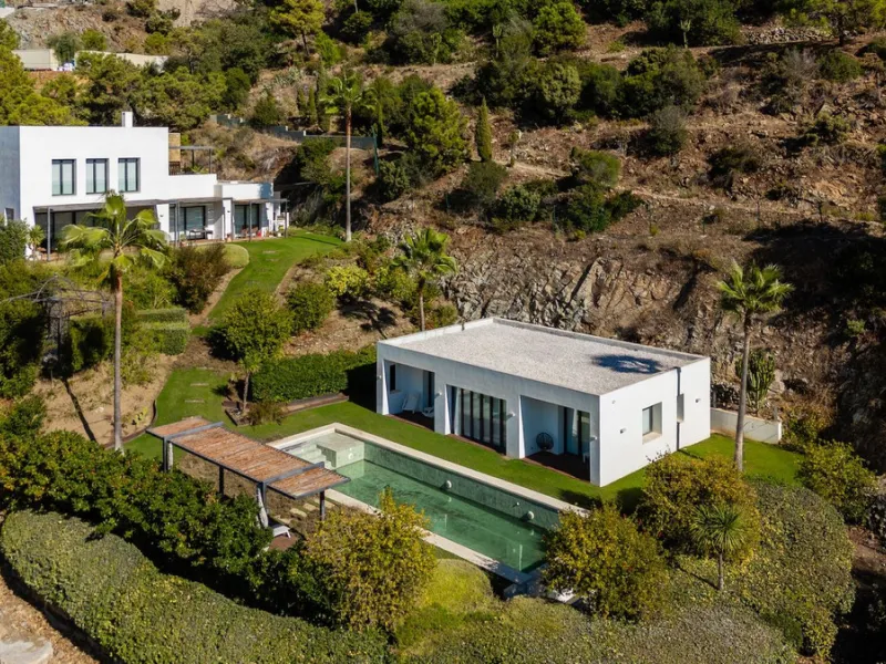 Modern Mediterranean villa in El Madroñal, a contemporary hillside retreat with breathtaking mountain and sea views.