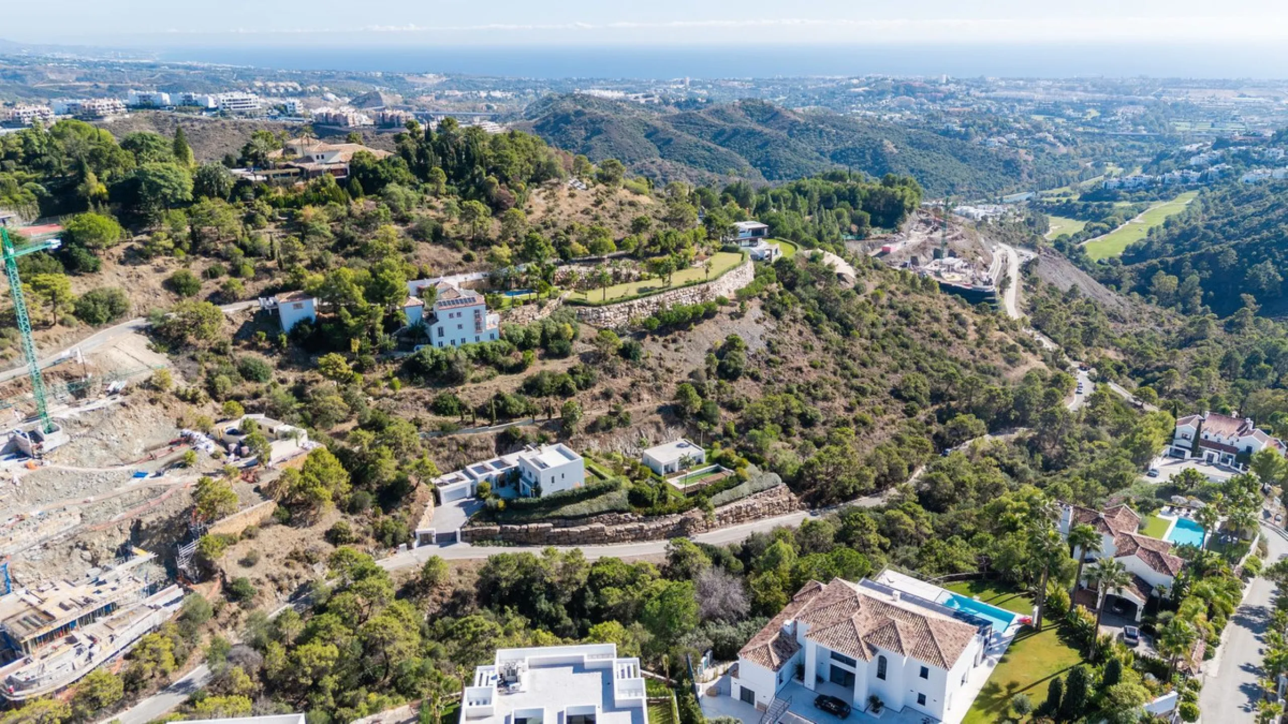 Modern Mediterranean villa in El Madroñal, a contemporary hillside retreat with breathtaking mountain and sea views.