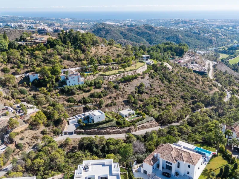 Modern Mediterranean villa in El Madroñal, a contemporary hillside retreat with breathtaking mountain and sea views.
