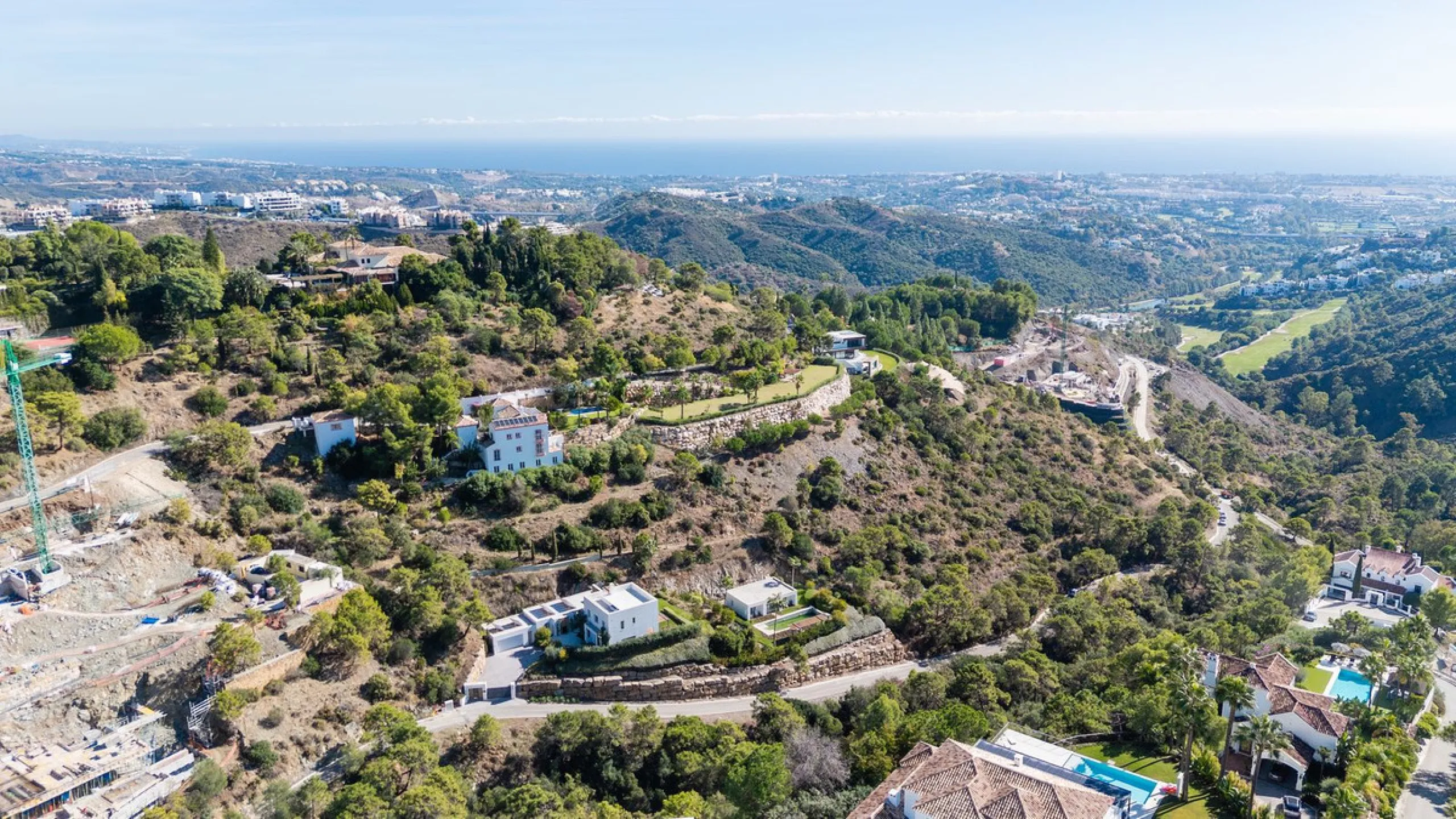 Modern Mediterranean villa in El Madroñal, a contemporary hillside retreat with breathtaking mountain and sea views.