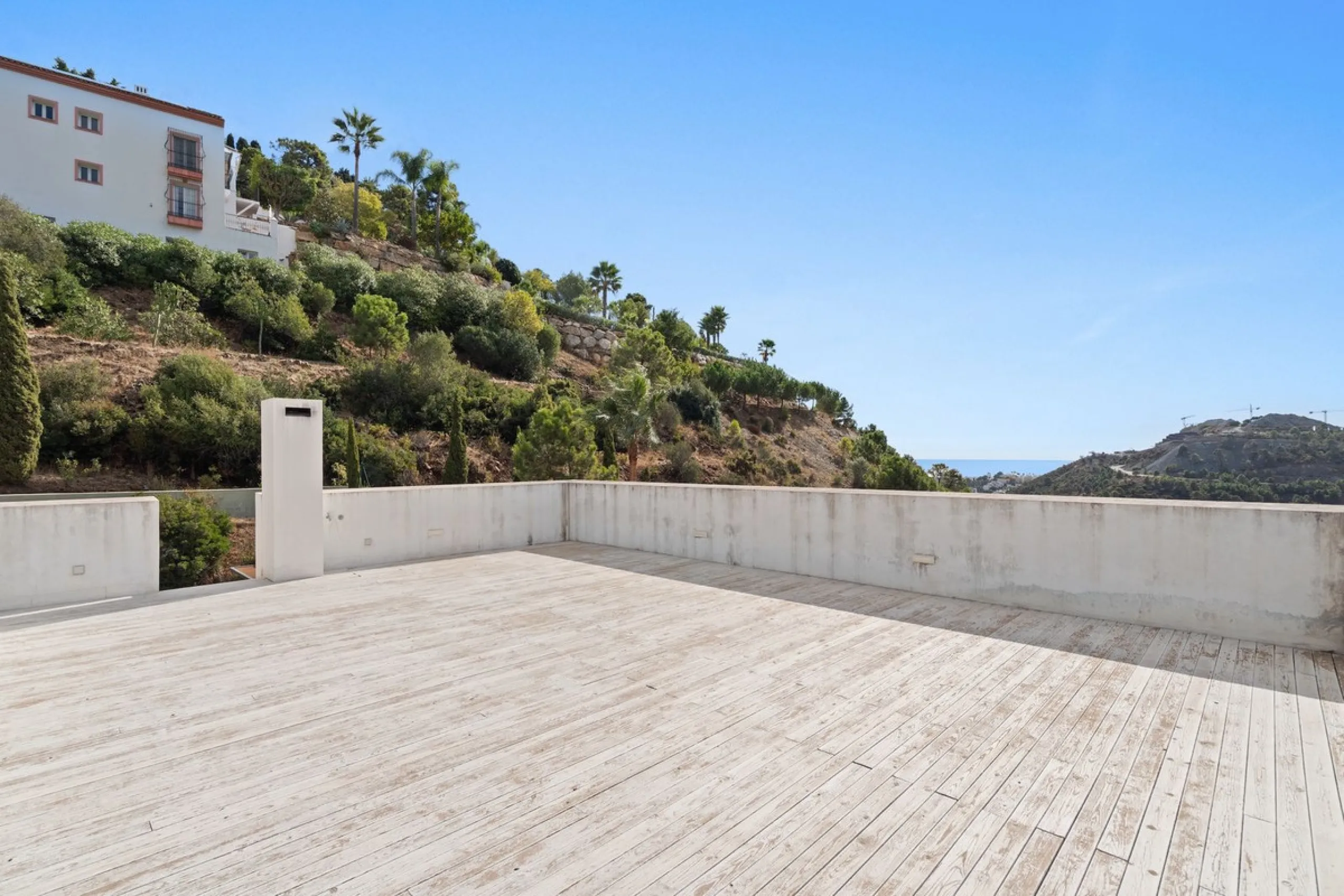 Modern Mediterranean villa in El Madroñal, a contemporary hillside retreat with breathtaking mountain and sea views.