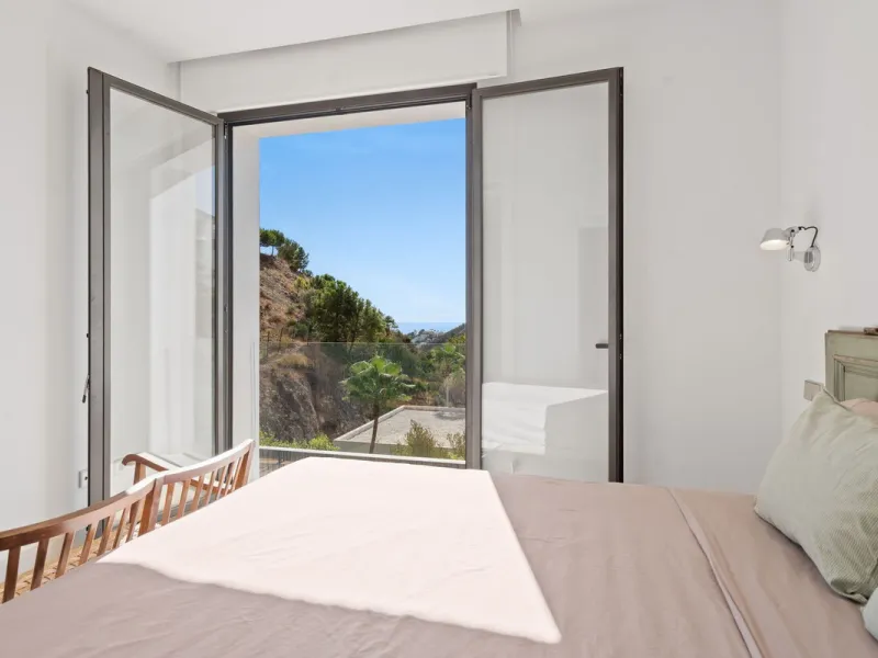Modern Mediterranean villa in El Madroñal, a contemporary hillside retreat with breathtaking mountain and sea views.