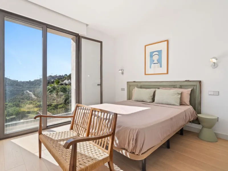 Modern Mediterranean villa in El Madroñal, a contemporary hillside retreat with breathtaking mountain and sea views.
