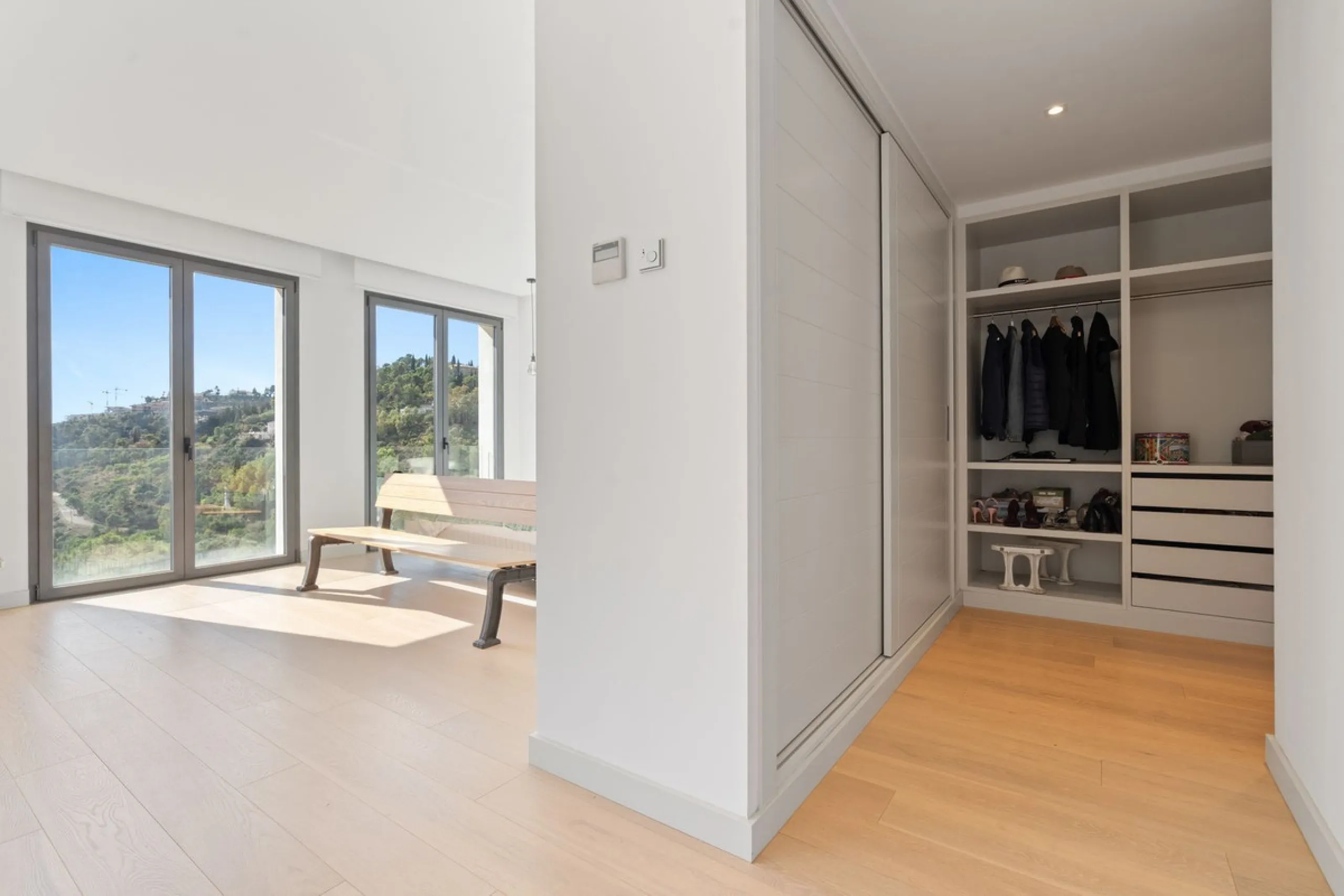 Modern Mediterranean villa in El Madroñal, a contemporary hillside retreat with breathtaking mountain and sea views.