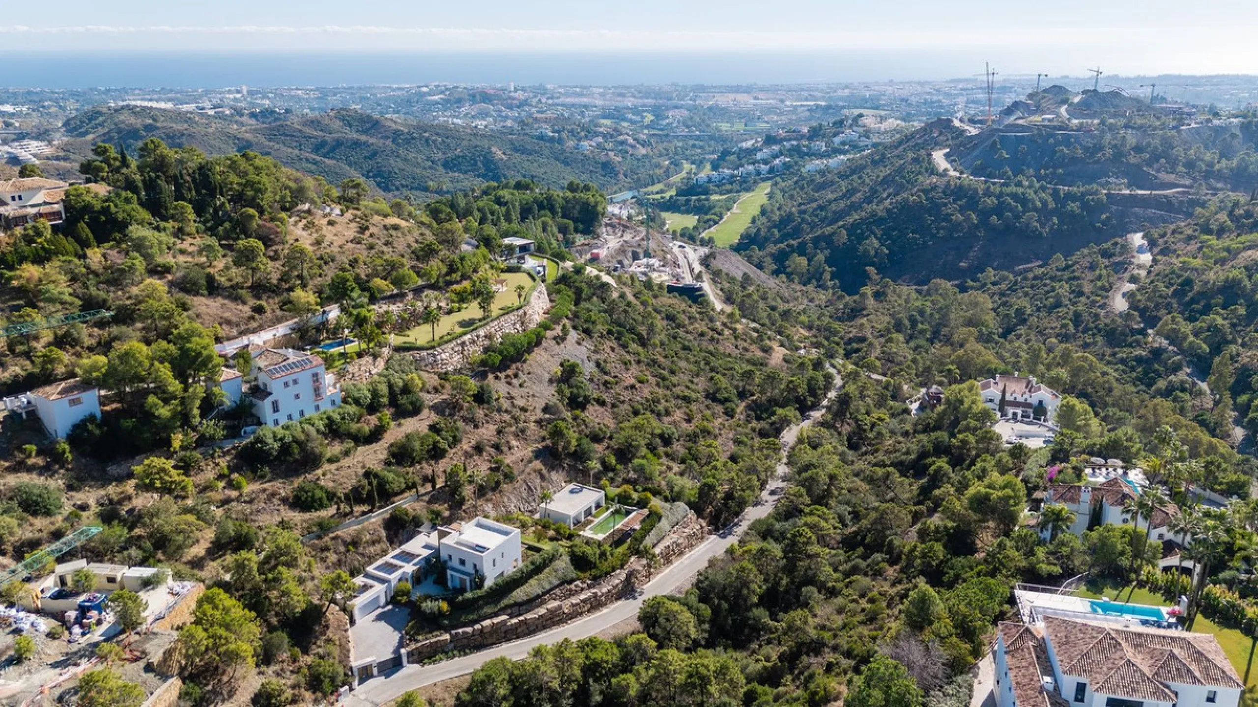 Modern Mediterranean villa in El Madroñal, a contemporary hillside retreat with breathtaking mountain and sea views.