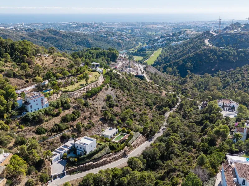 Modern Mediterranean villa in El Madroñal, a contemporary hillside retreat with breathtaking mountain and sea views.