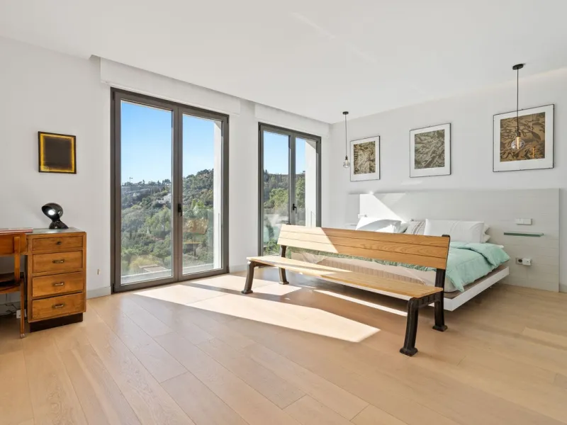 Modern Mediterranean villa in El Madroñal, a contemporary hillside retreat with breathtaking mountain and sea views.