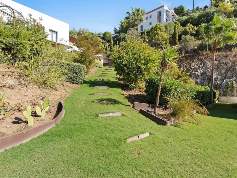 Modern Mediterranean villa in El Madroñal, a contemporary hillside retreat with breathtaking mountain and sea views.