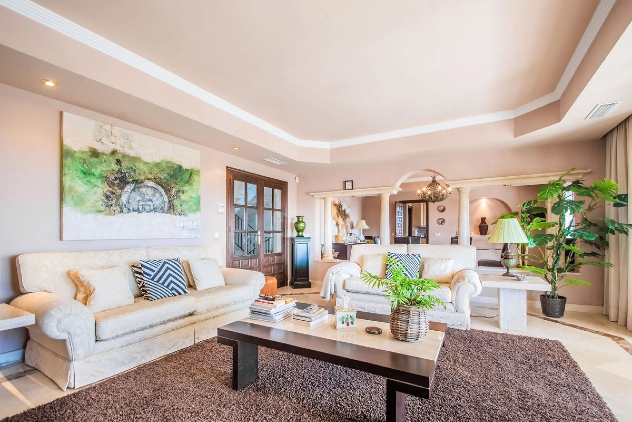 This stunning villa, accompanied by three adjoining buildable plots, presents an exceptional investment opportunity. Boasting six bedrooms and five bathrooms, this property offers abundant space and comfort. Revel in panoramic views of the sea and mountai