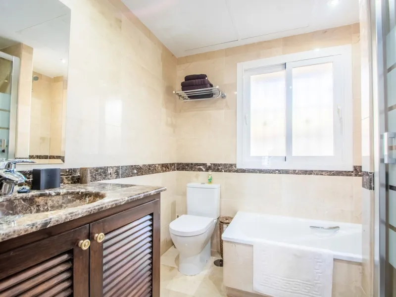 This stunning villa, accompanied by three adjoining buildable plots, presents an exceptional investment opportunity. Boasting six bedrooms and five bathrooms, this property offers abundant space and comfort. Revel in panoramic views of the sea and mountai