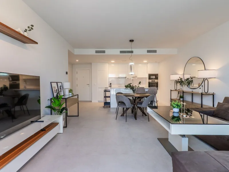 This stylish 93m² apartment with an 11m² terrace offers an ideal mix of contemporary comfort and an exceptional location. Only a 10-minute walk from the lively Estepona Port marina, the property features an airy open-plan design with a high-end kitchen, t