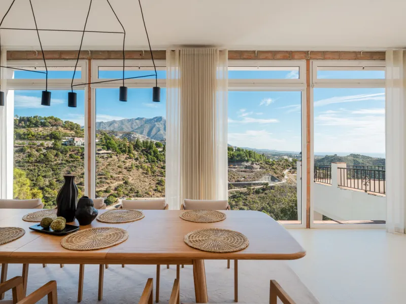 Villa in El Madroñal for sale, offering refined living within the exclusive gated community of El Madroñal 2 in Benahavís, Málaga. This six-bedroom villa with five ensuite bathrooms combines traditional Andalusian features with contemporary design. Built 