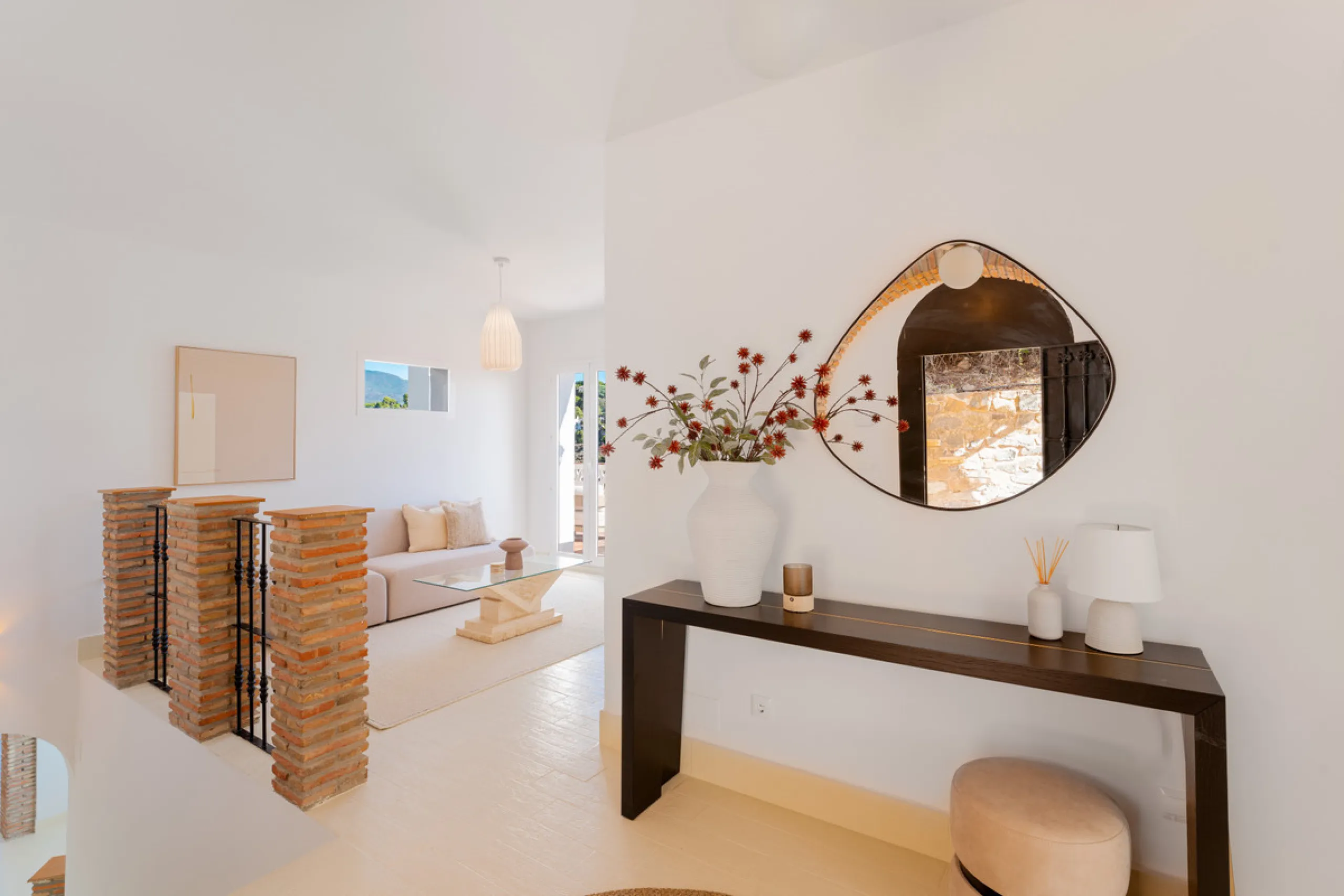 Villa in El Madroñal for sale, offering refined living within the exclusive gated community of El Madroñal 2 in Benahavís, Málaga. This six-bedroom villa with five ensuite bathrooms combines traditional Andalusian features with contemporary design. Built 