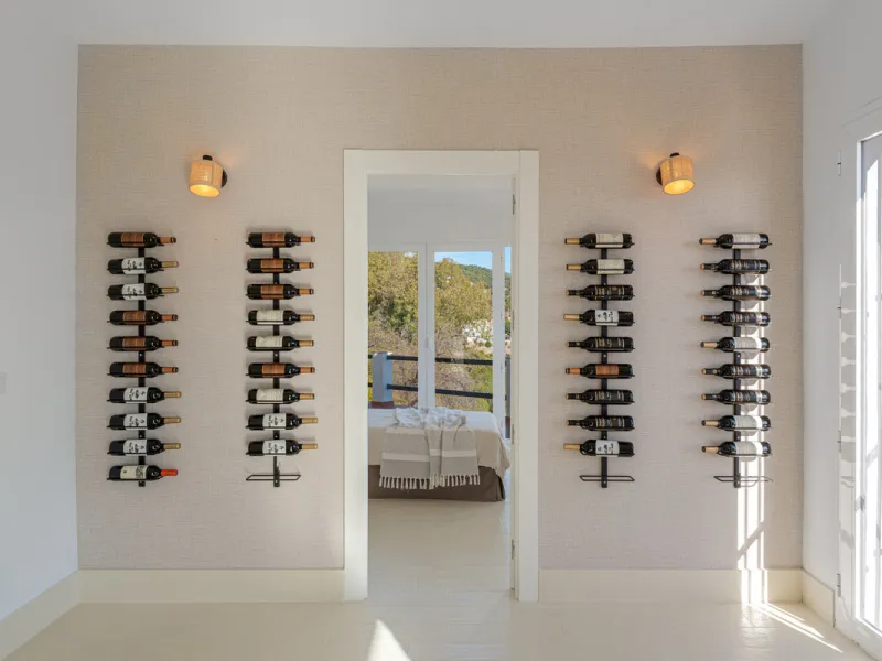 Villa in El Madroñal for sale, offering refined living within the exclusive gated community of El Madroñal 2 in Benahavís, Málaga. This six-bedroom villa with five ensuite bathrooms combines traditional Andalusian features with contemporary design. Built 
